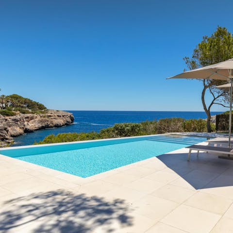 Take in the Mediterranean Sea views from the saltwater pool
