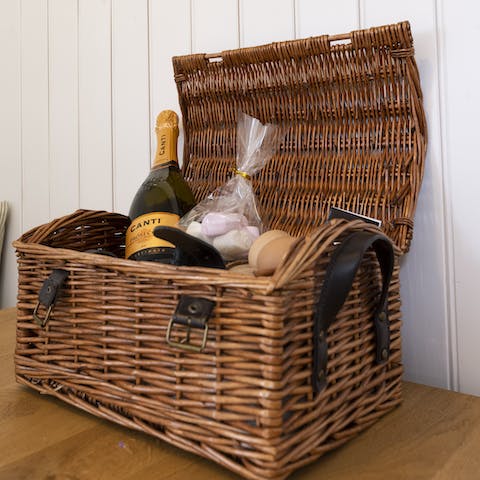 Tuck into the delightful treats in the welcome hamper from your host