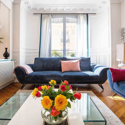 Kick back in the bright living room with a glass of French wine after a day of Paris sightseeing