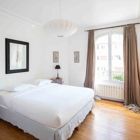 Wake up to 15th arrondissement views in the master bedroom