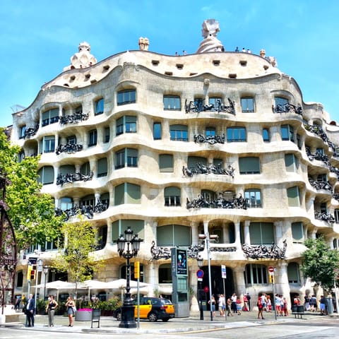 Visit the Gaudí-designed Casa Milà, less than a ten-minute walk away
