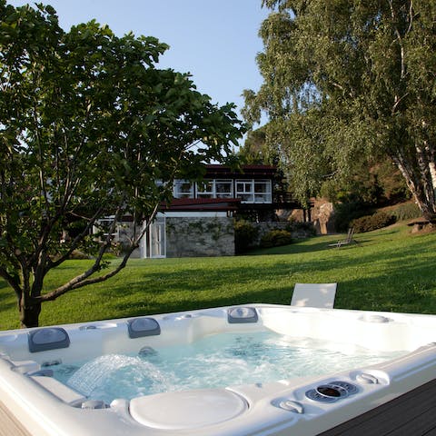 Soak your muscles in the hot tub after a volleyball match on private grounds