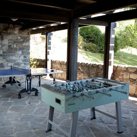Challenge your loved ones to table football before canoeing on Lake Como
