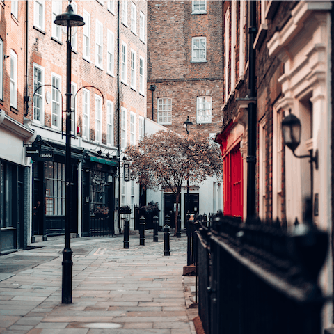 Explore the streets of trendy Soho, an eight-minute walk away