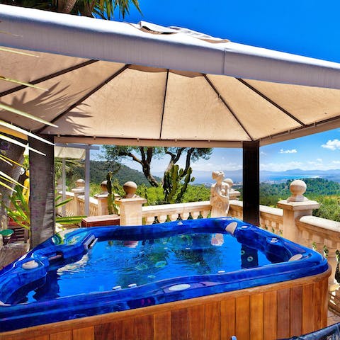 Relax in the hot tub – why not watch the sunset?