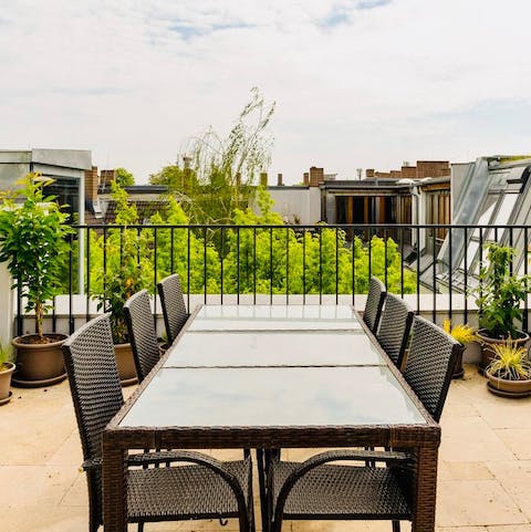 Enjoy alfresco dining on the peaceful rooftop terrace