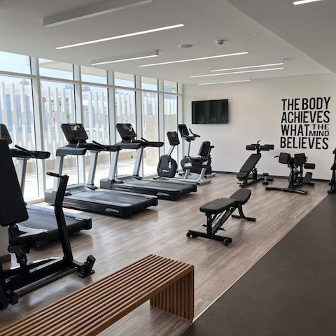Keep on top of your fitness routine with a workout in the on-site gym