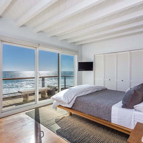 Awaken to the sound of the waves in the large, sun-filled bedroom