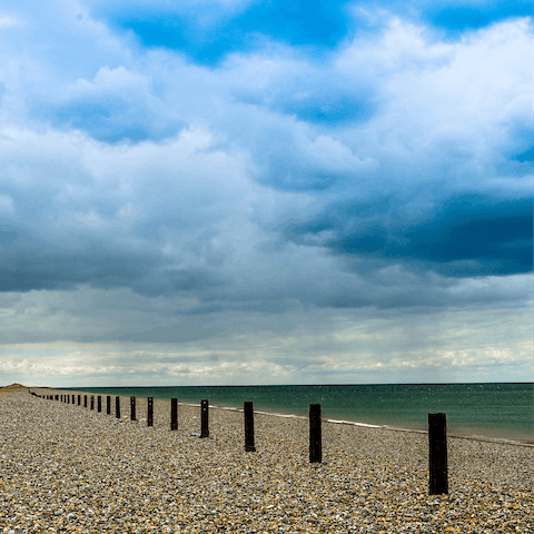 Take the short drive to Holt, with a visit to Salthouse beach a must