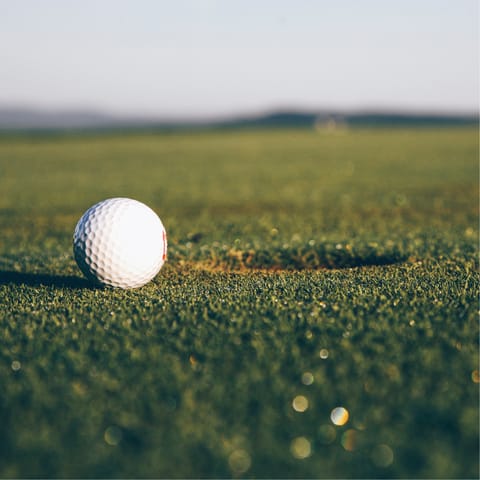 Drive twelve minutes to Castelfalfi Golf Club and practice your swing