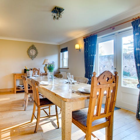 Lay the table for an evening meal with views of the pretty gardens