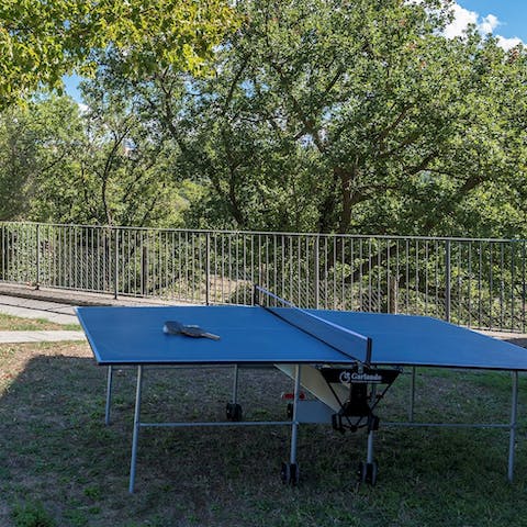 Enjoy an alfresco game of ping pong on the lawn