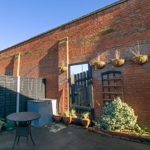 Begin your day with morning coffee in the sunny courtyard