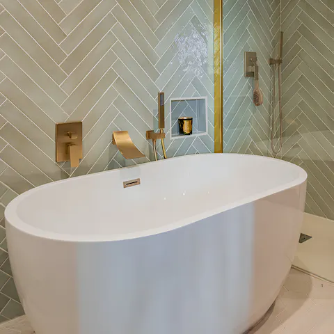 Have a soak in the freestanding bath after a busy day exploring Paris