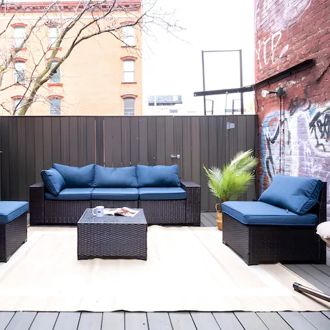 Relax on the private terrace after a busy day exploring the city
