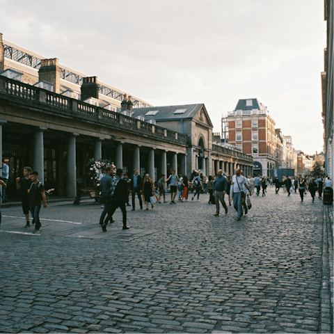 Peruse the shops and cafes that line Covent Garden Piazza, just around the corner