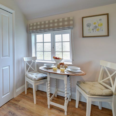 Enjoy a hearty breakfast each morning at the bright dining nook