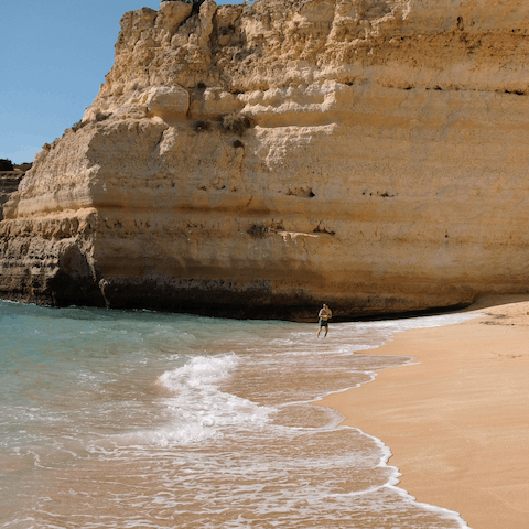 Head to Benagil beach, a stunning spot with caves to explore, based just a short drive away