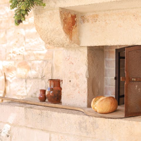 Bake bread the traditional Puglian way in the stone oven