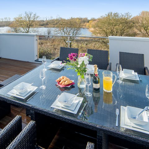Enjoy dinner up on the rooftop terrace overlooking Lake Swillbrook
