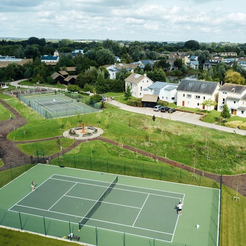 Pack your whites and book a slot on one of the estate's tennis courts