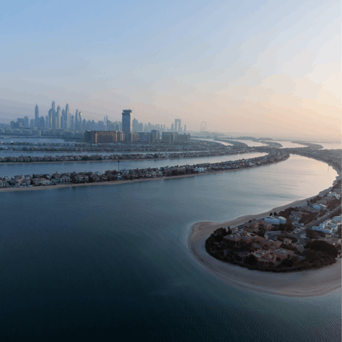 Drive over to Palm Jumeirah in ten minutes and explore the upmarket boutiques and sandy beaches