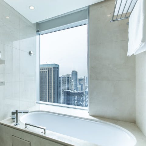 Run yourself a steamy bath and enjoy the sensational view