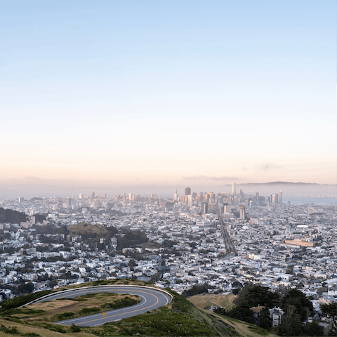 Take a twenty-minute hike up to Twin Peaks to catch sunset city views