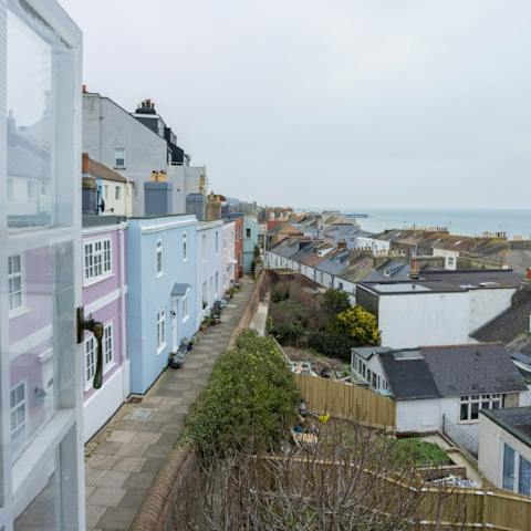 Look out over the rooftops and take in sea views from the window