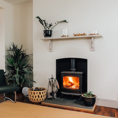 Cosy up in front of the log burner on chillier evenings