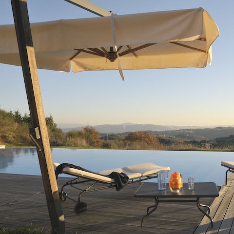 Soak up views of the Italian countryside from the private infinity pool