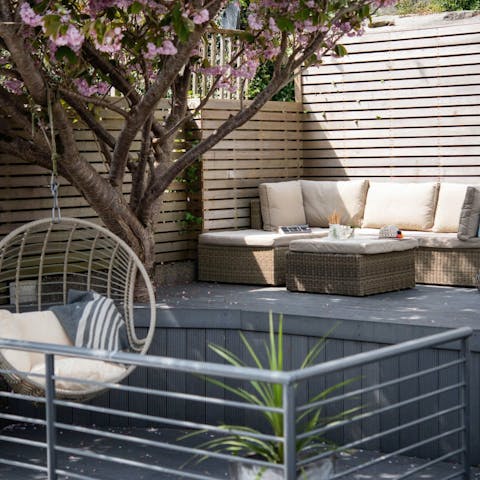 Enjoy drinks outside as you make yourself comfortable on the decking