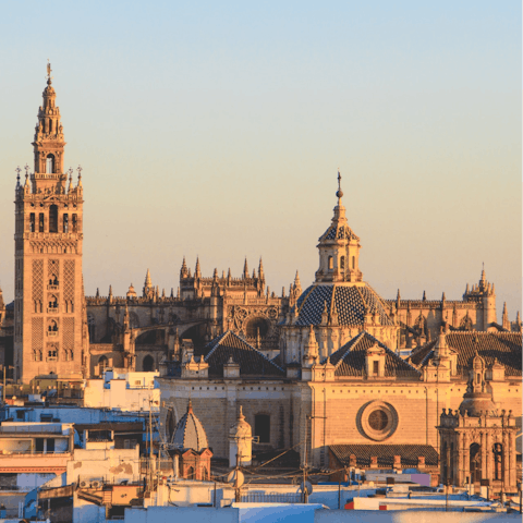 Visit Seville Cathedral and see its iconic bell tower, a five-minutes walk