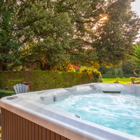 Unwind in your private Jacuzzi while the kids play in the garden