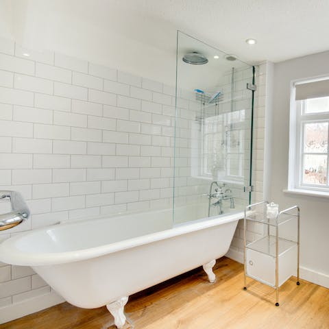 Treat yourself to a long soak in the clawfoot tub after a day by the seaside