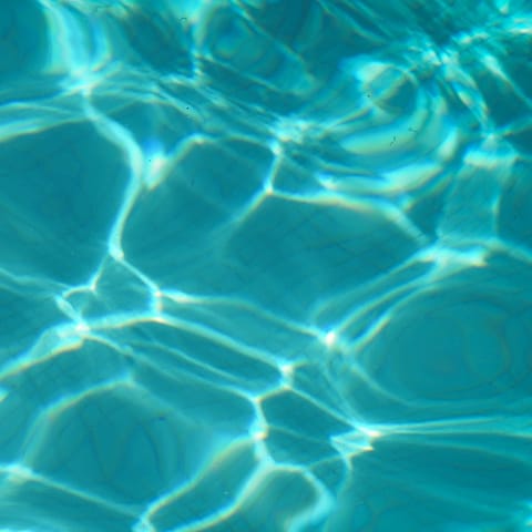 Enjoy refreshing swims in the communal pool