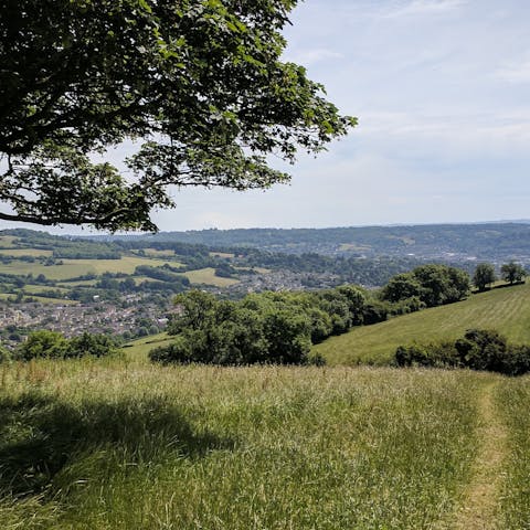 Follow hiking and cycle trails through the Cotswolds countryside