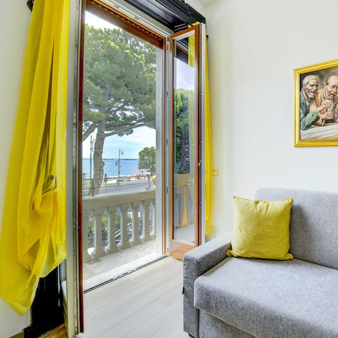 Open up the French doors and admire spectacular views of the lake