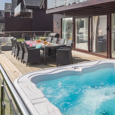 Indulge in a post-surf soak in the private hot tub out on the deck