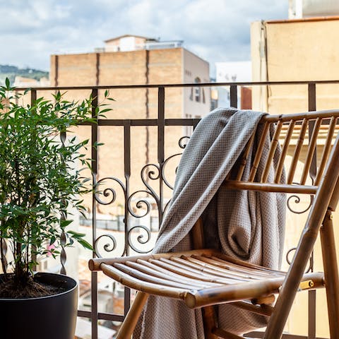 Step out to the balconette with your morning coffee as the city wakes up