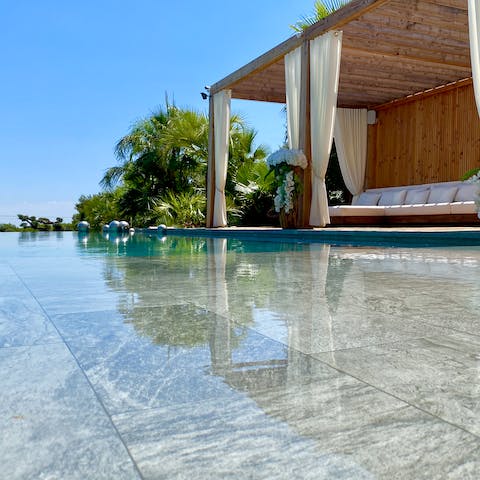 Spend your days by the infinity pool