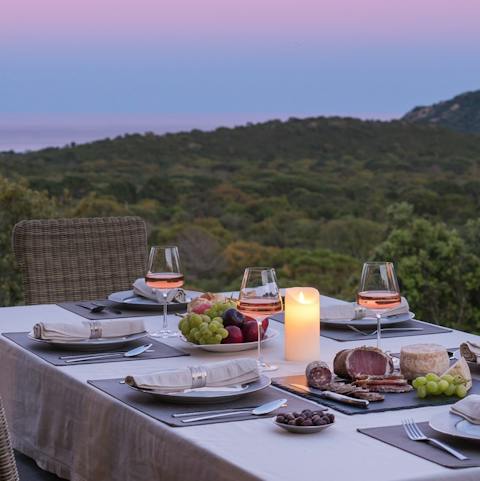 Dine alfresco on the outdoor patio with the sunset to keep you company 