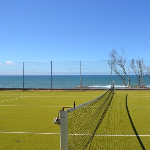 Get out on the tennis court for a set or two in the sea breeze 