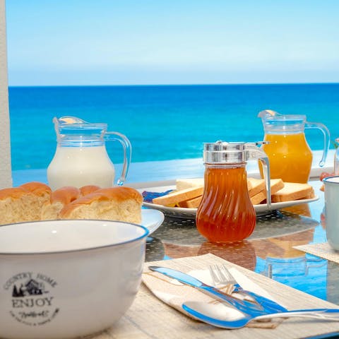 Savour an al fresco breakfast of paximadia, myzithra cheese, and honey