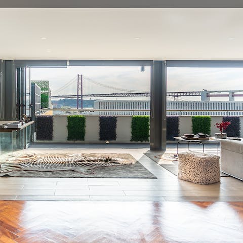 Enjoy spectacular views of the 25th of April Bridge with your morning coffee