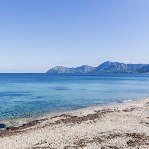Begin your day with a stroll along the beach of Son Serra