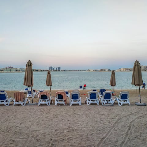 Head down to the building's private beach and swim in the Gulf