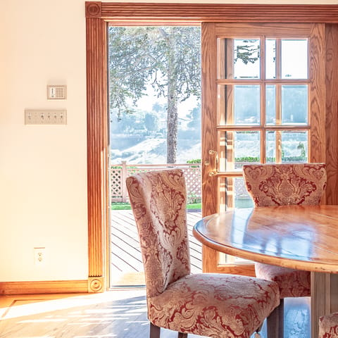 Fling open the French doors and enjoy breakfast at your dining table