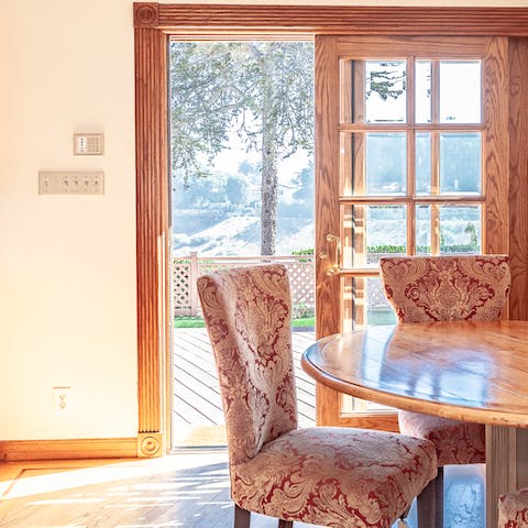 Fling open the French doors and enjoy breakfast at your dining table