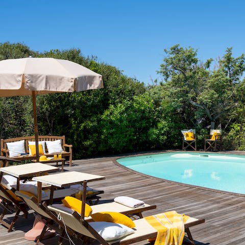Sip a chilled glass of Italian wine as you recline poolside, absorbing the sun